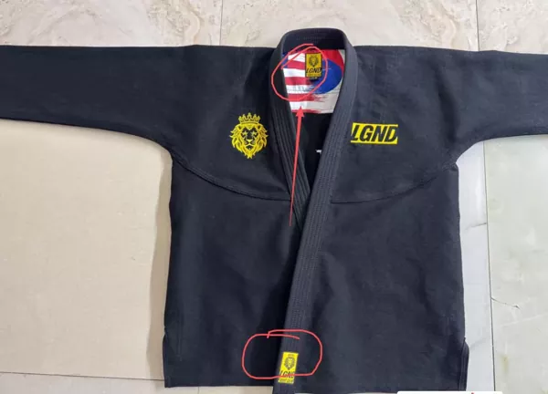 Custom BJJ gi with Viking embroidered badges, sublimated back artwork and branded woven tags